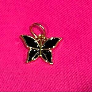 NWT water resistant. 18k gold double plated brass. butterfly pendant black
